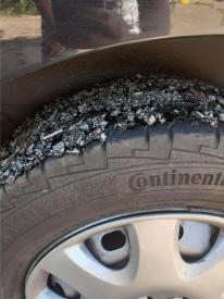 Louise said travelling on the melted road was like "driving through water"